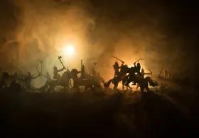 Scene of a battle on horseback with fire in background