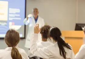 Clinician presenting to students