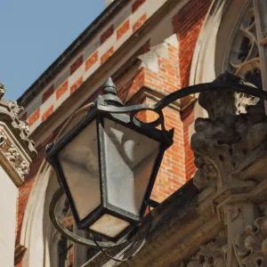 Looking up at Cambridge architecture with blue sky behind