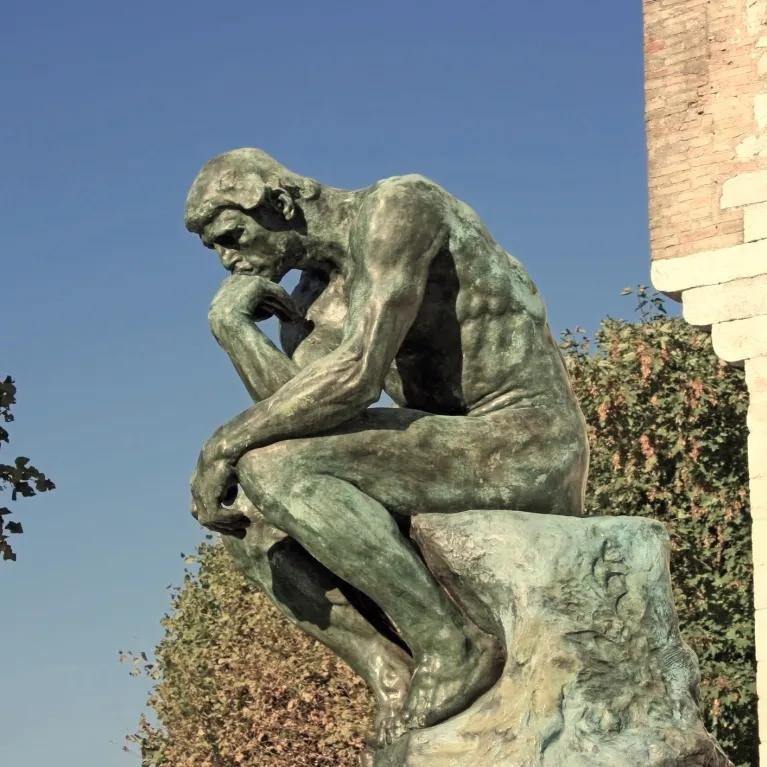 Statue of person thinking