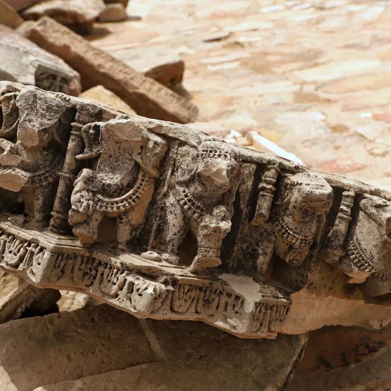 Architectural artifact depicting a battle