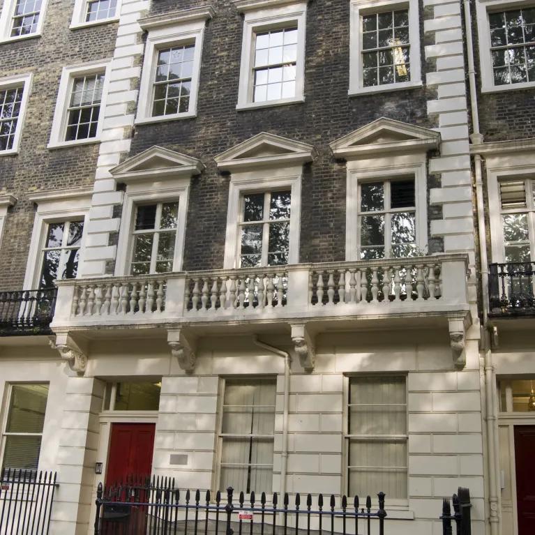 Bloomsbury style building with red front door