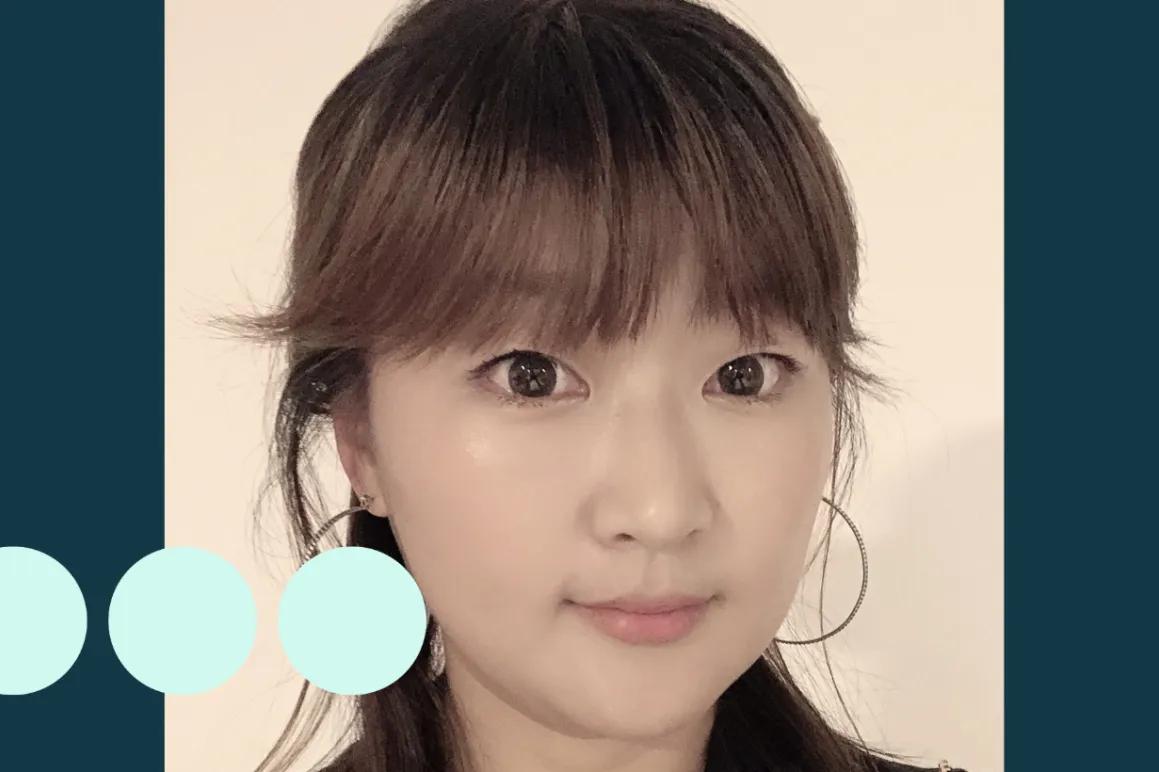 Selfie of Asian woman with hair half up half down